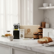Luxury Greek Breakfast Hamper contents on a modern kitchen counter with Mouriki herbal tea.