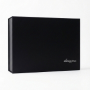 Closed black magnetic presentation box with elenianna Luxury logo for a Greek olive oil tasting kit