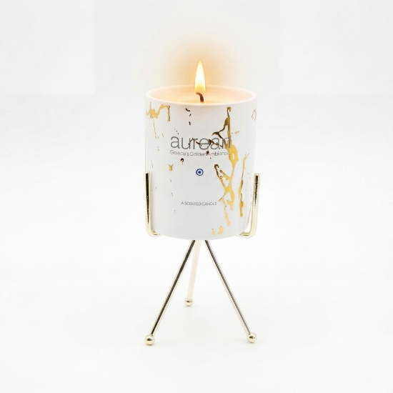 Aurean Pantheon luxury scented candle with gold accents on elegant metal stand – premium Greek candle decor