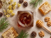 Theta Greek Pine Honey Infused with Mountain Tea Essence on a clean ecommerce background