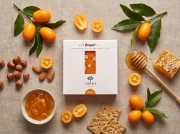 Lazaris Mandolato Koumquat – Greek Almond Nougat with Kumquat, 150g on a clean ecommerce background